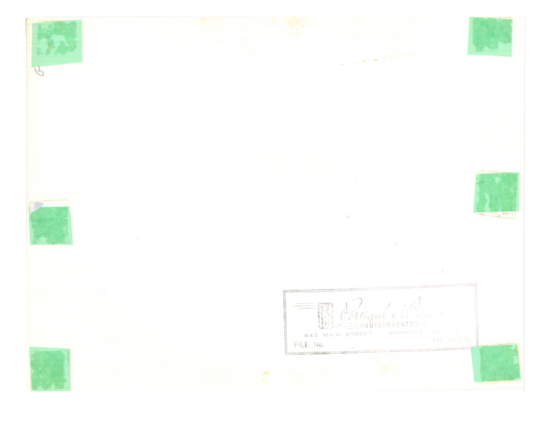 Verso: Photographer's stamp: "Portigal & Wardle Photographers 445 Main Street Winnipeg, Canada File No. PH. 93 636"
