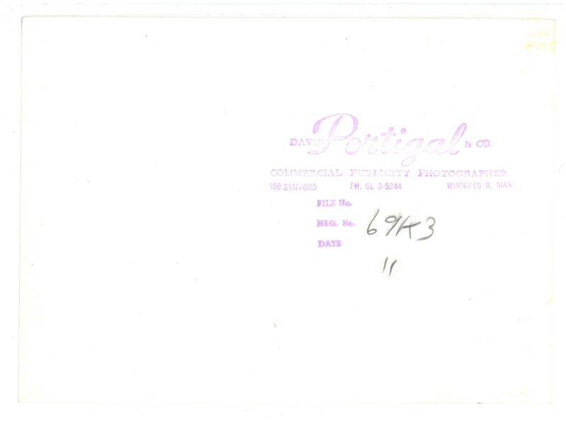 Verso: Photographer's Stamp: "David Portigal & Co. Commercial Publicity Photographer 559 Stafford PH. GL 3-5244 Winnipeg 9, Man. File No. 69K3 [pencil] Neg. No 11 [pencil] Date.