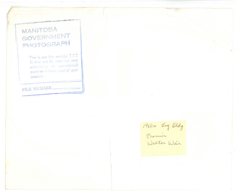 Verso: Stamp "Manitoba Government Photograph, sticky note: "1960s Leg. Bldg Premier Walter Weir"