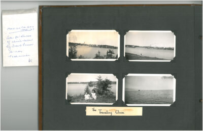 Photo album page with 4 images labelled "The Traveling Clinic." Three photos are landscape views of bodies of water, and the fourth photo shows two young children sitting in the grass by a body of water. An accompanying note reads: "Manigotagan 1936-37 All pictures of clinic taken by Doug Fraser X-ray technician"