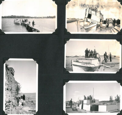 Photo album page containing five photos. Four photos depict men on docks next to boats on water, and one photo shows a man standing an the base of a cliff next to a body of water.