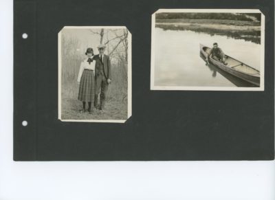 A page from a photo album with two photos. The first photo shows a man and a woman standing outdoors surrounded by trees. The second photo shows a man in a canoe on a body of water.
